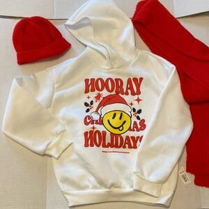 Adorable holiday sweater with a red scarf 🧣 and a red hat to match it all